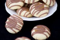 Twix Thumbprint Cookies with Chocolate Caramel Centers