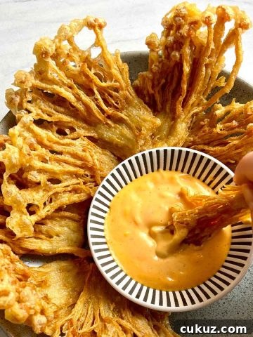 plate of fried enoki mushrooms with spicy mayo