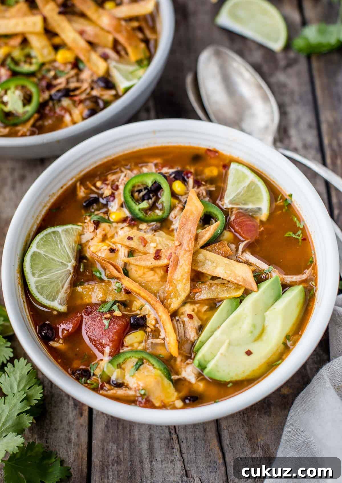 A bowl of chicken tortilla soup made with smoked chicken
