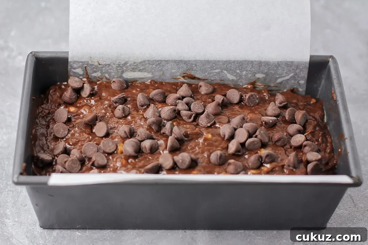 Chocolate banana bread recipe in loaf pan.
