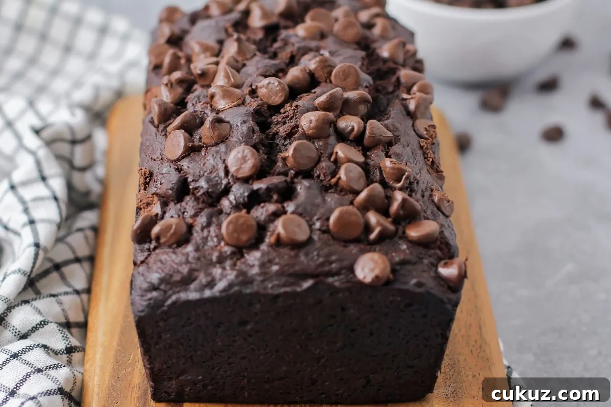 Chocolate banana bread close up image on cutting board.