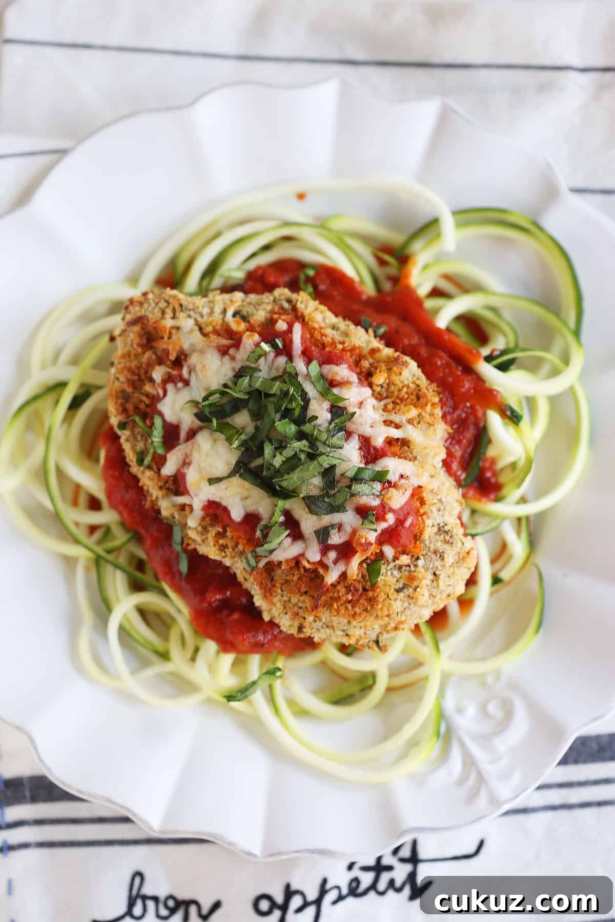 Baked Chicken Parmesan Over Zucchini Noodles Bowl 4 This recipe for Baked Chicken Parmesan with Zucchini Noodles is healthy, delicious and can easily be made in just 30 minutes or less!