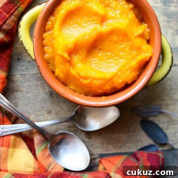 A serving dish of roasted garlic butternut squash puree