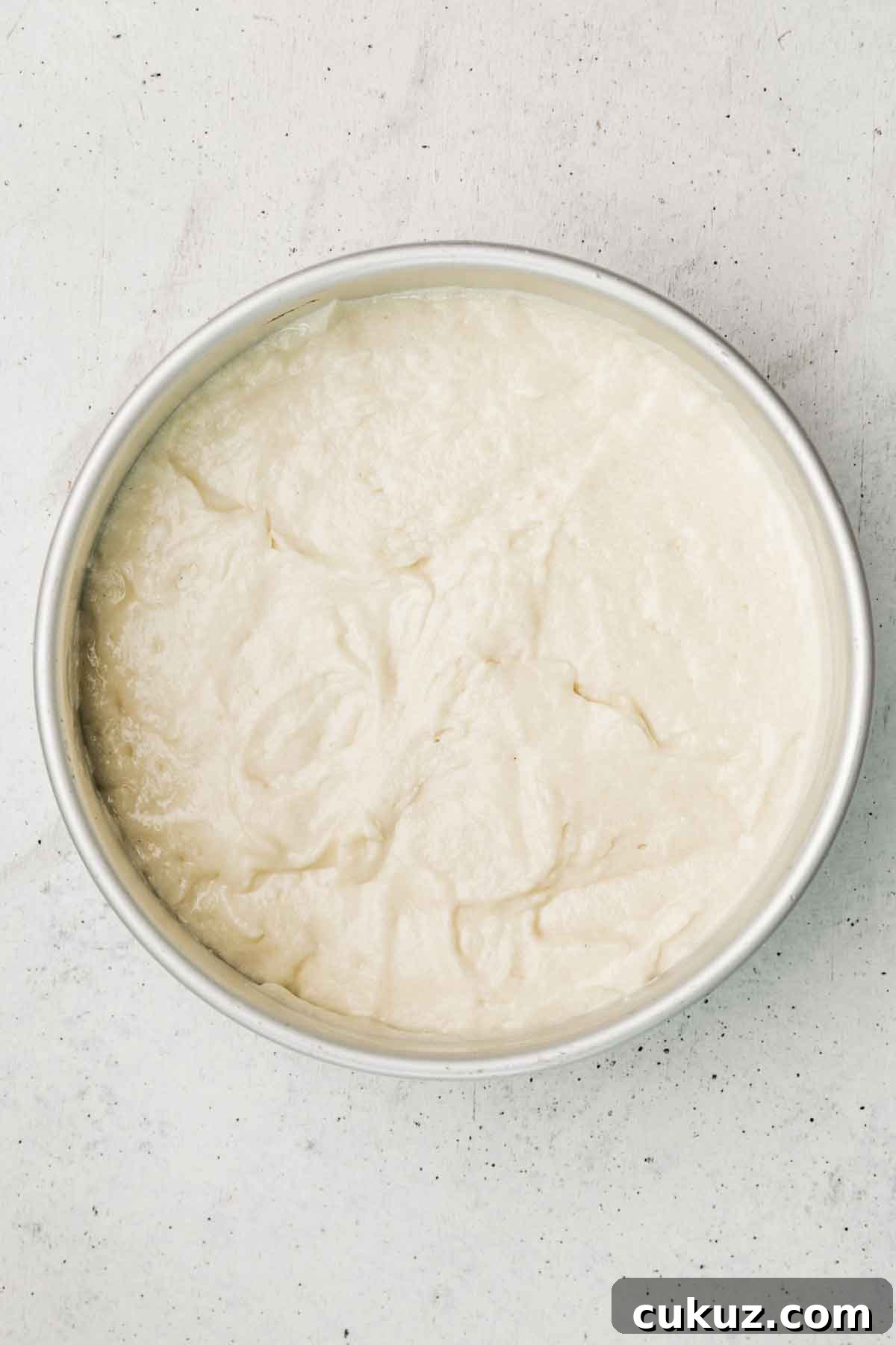 moule à gâteau avec de la pâte 