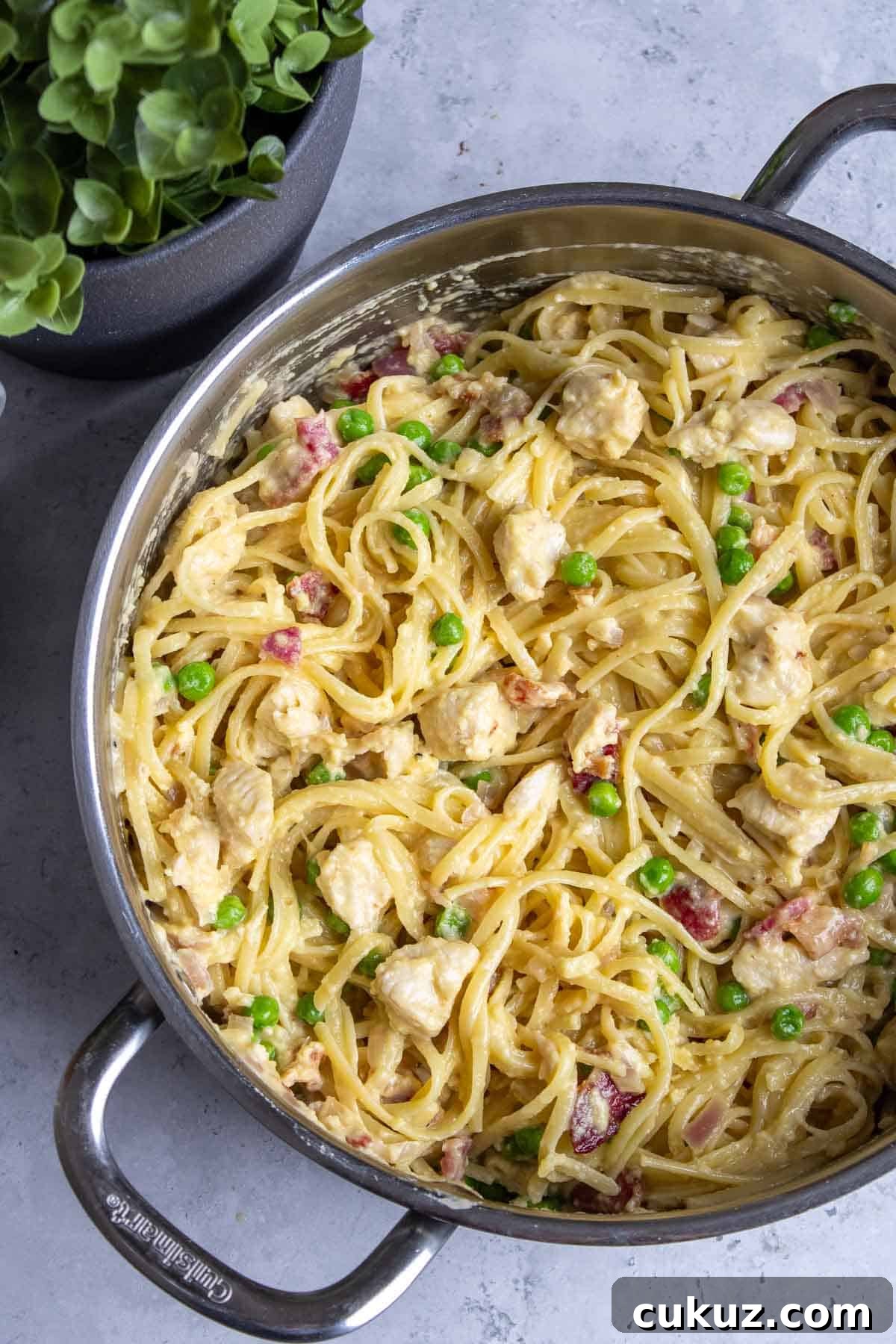 Chicken Bacon carbonara in a pan.