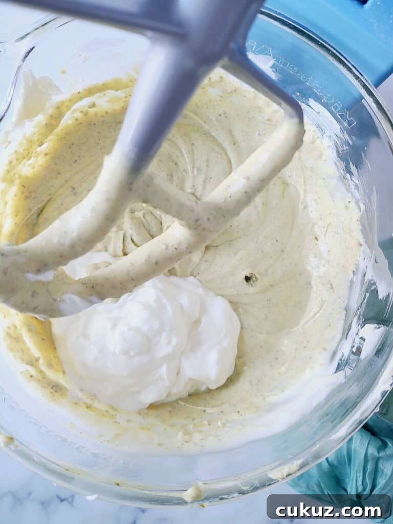 Adding sour cream into cheesecake batter