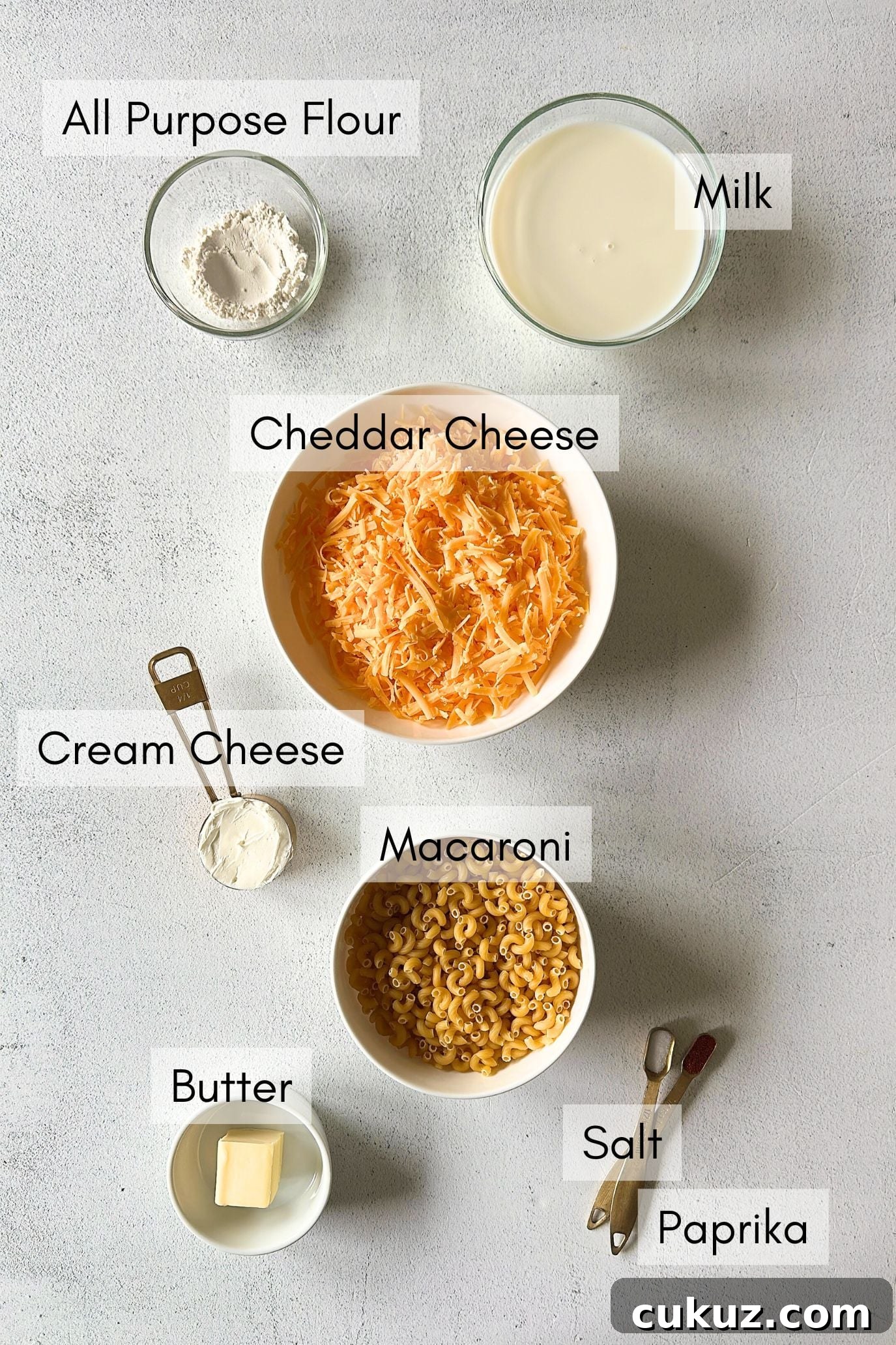 Cheesy Mac and Cheese Muffins: Savory Bite-Sized Comfort Food 3 Ingredients to make mac and cheese muffins.