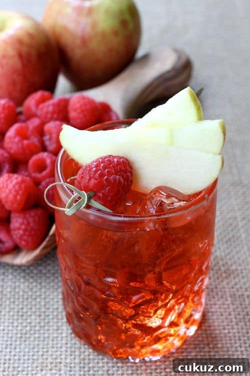  Raspberry Cider Whiskey is a cold cider cocktail with whiskey and raspberries