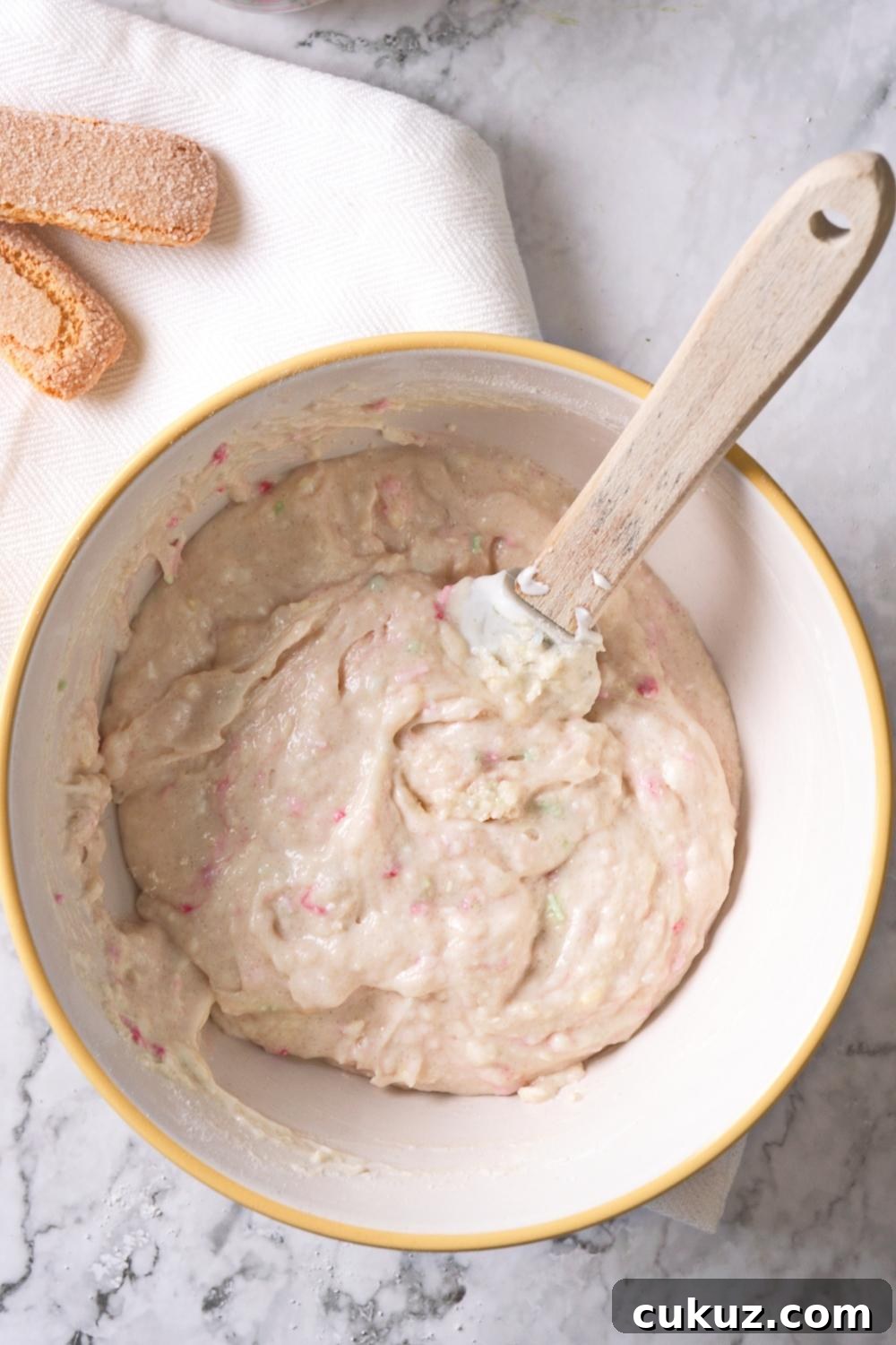 Quick 4-Ingredient Dunkaroo Dip Ready in 5 Minutes 6 An overhead view of a large mixing bowl with the homemade Dunkaroo mixture in it.