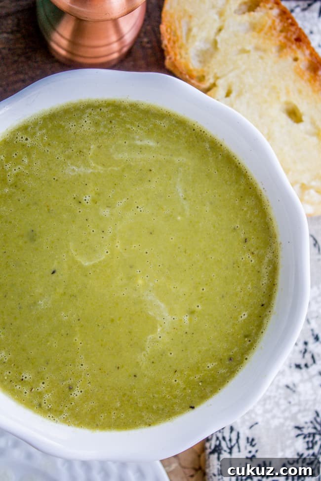 Creamy Frozen Pea Soup Ready in 30 Minutes 2 a bowl of pea soup.