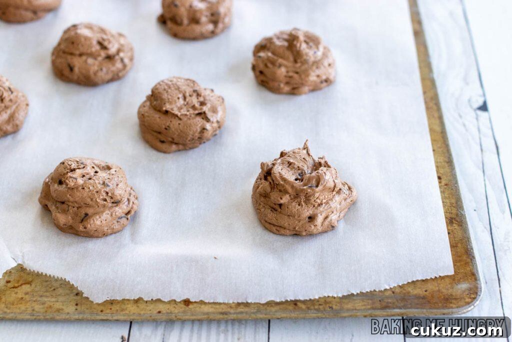 Ultimate Fudgy Chocolate Cookie Recipe for Intense Cocoa Flavor 13 batter on parchment lined baking sheet