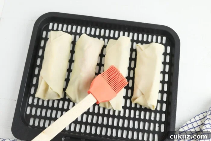 Crispy Pickle Egg Rolls with Tangy Dipping Sauce 6 brush with vegetable oil
