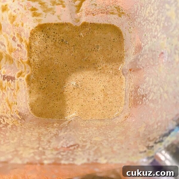 Blended veggies, spices, herbs, and marinade ingredients.