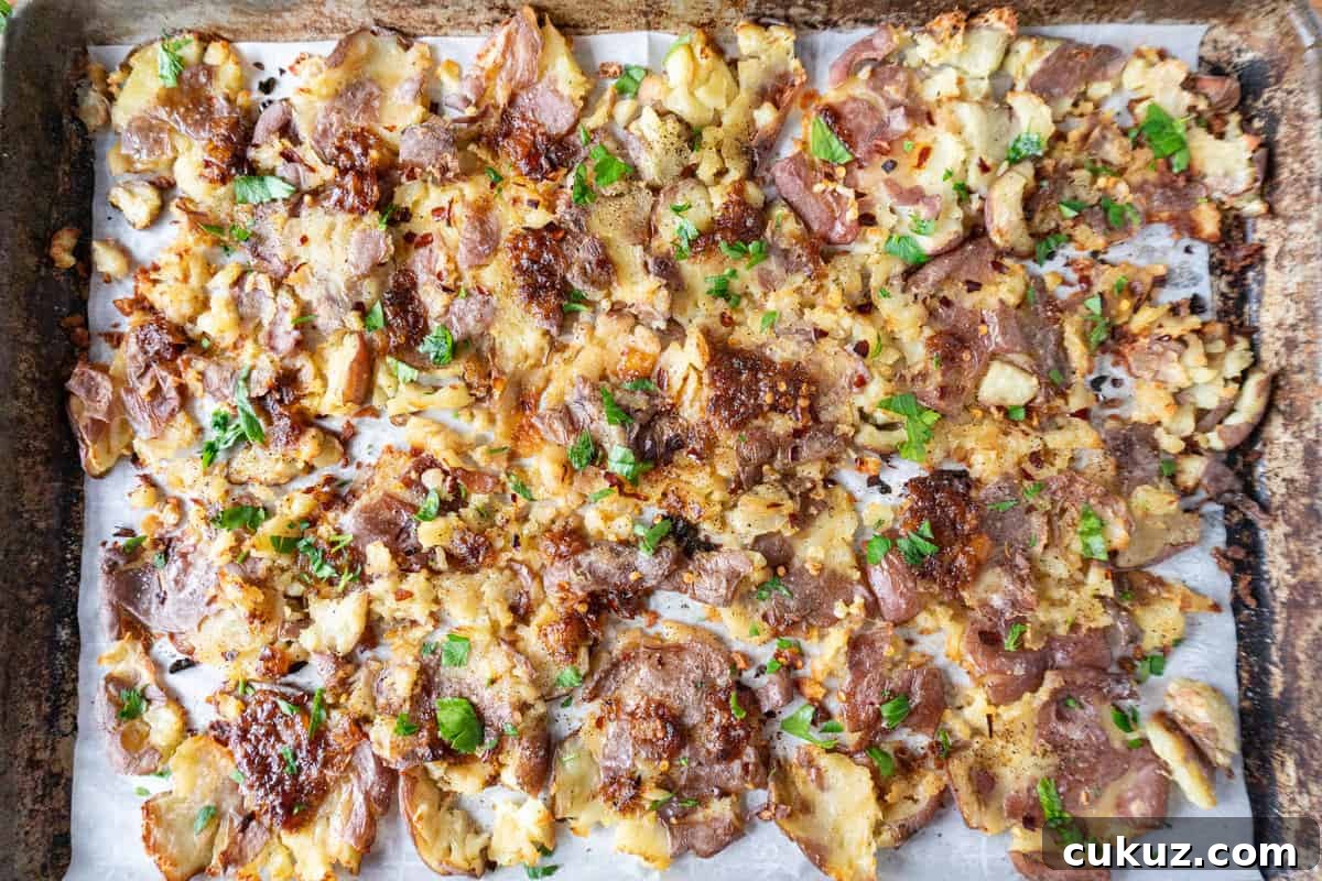 Crispy Potatoes baked with parsley on them