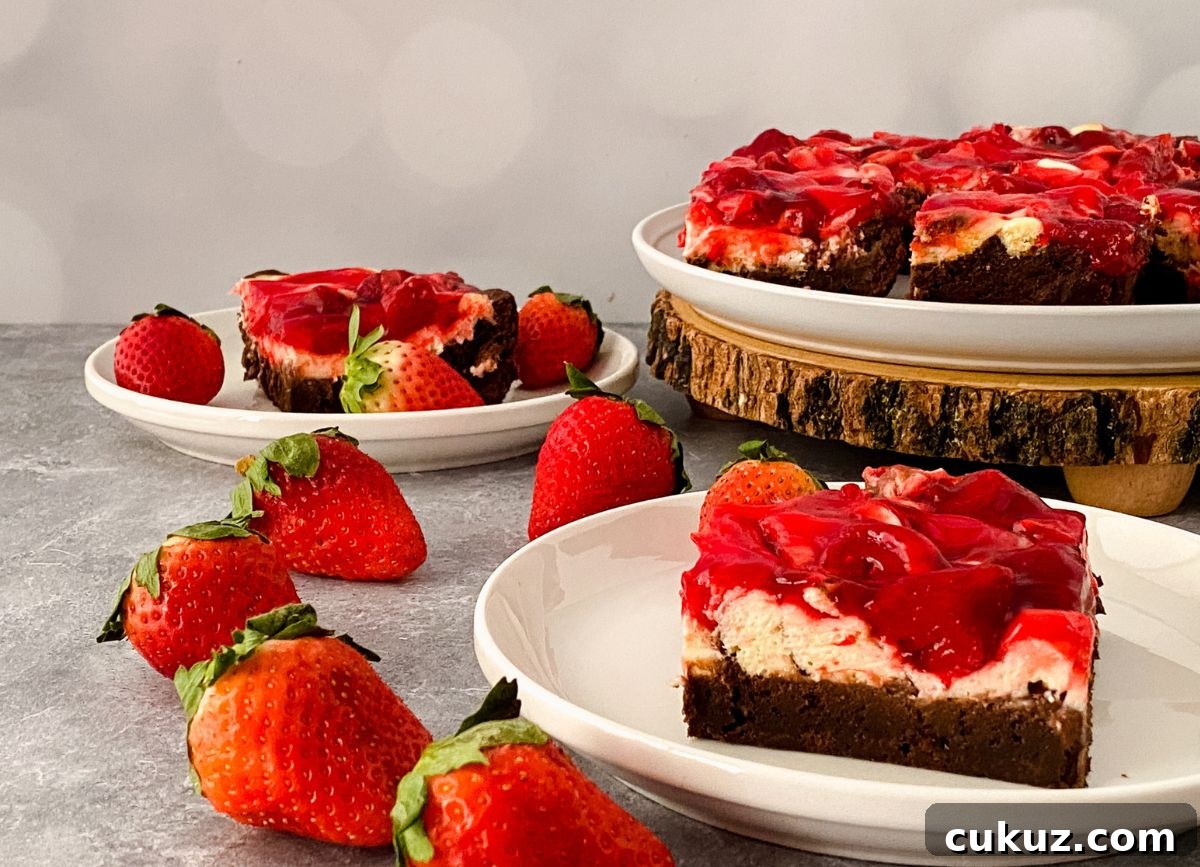A few pieces of gluten and dairy free strawberry cheesecake brownies.