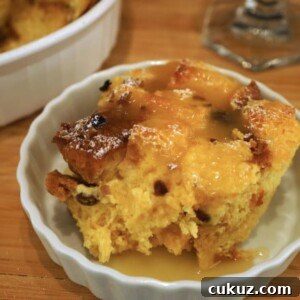 slice of pandoro bread pudding in a small white gratin