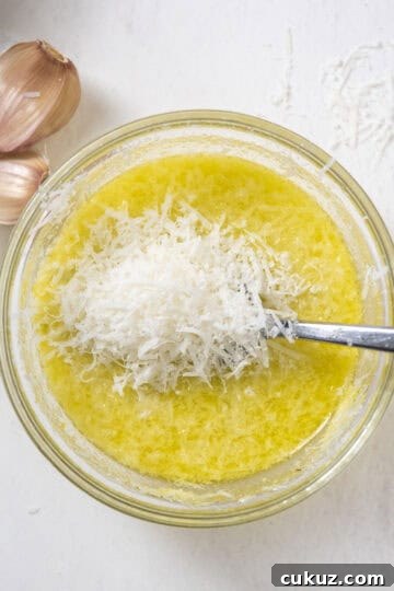 Added pecorino to lemon juice in a bowl.