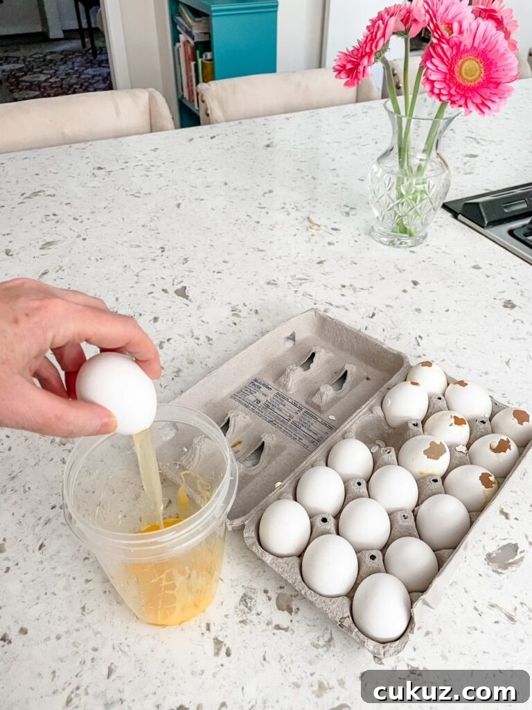 Separating the eggshells and yolk