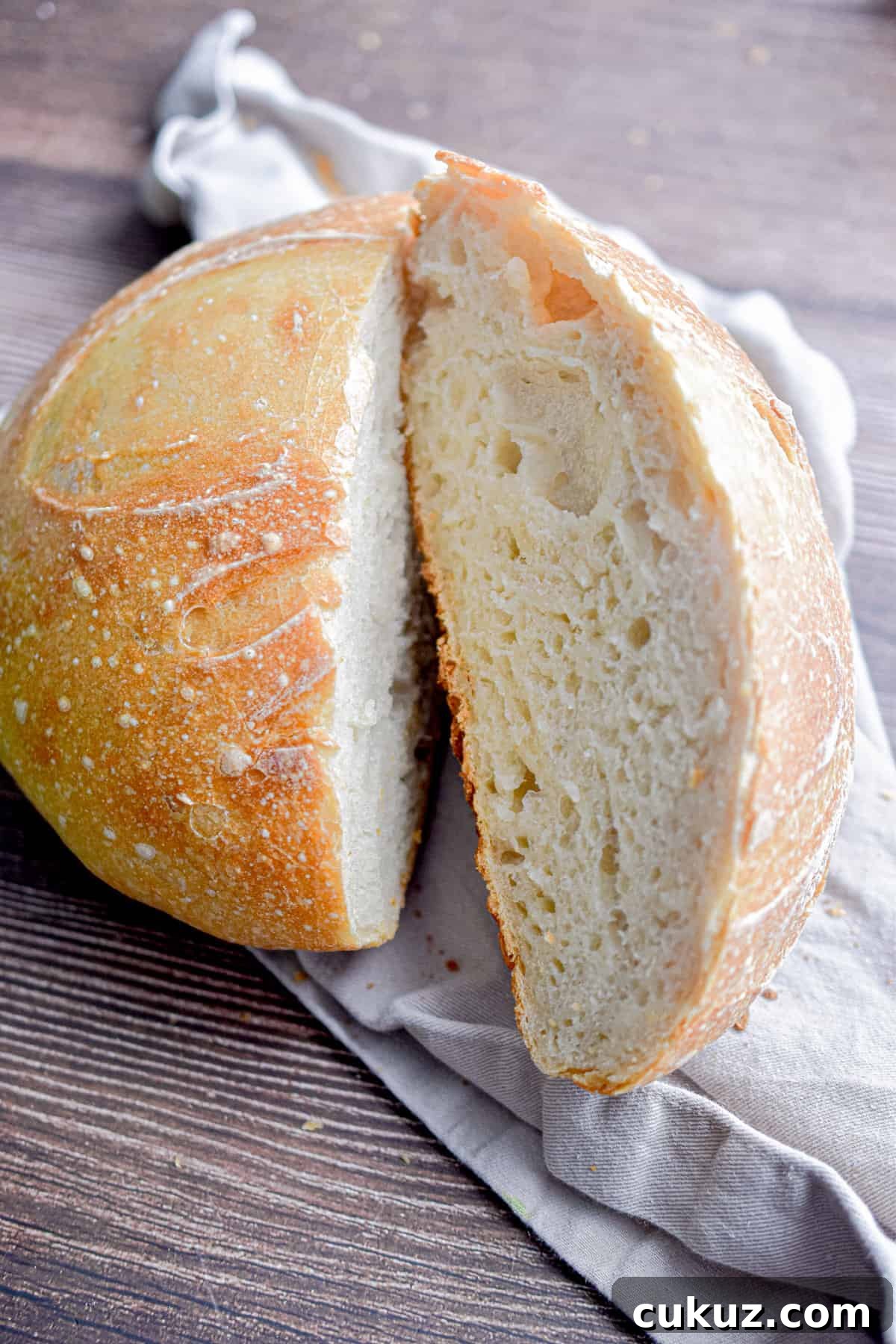 Bread Flour vs. All-Purpose Flour: Key Differences You Should Know 4 The bread loaf is cut in half.