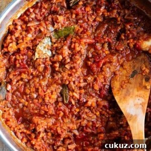 A close up cropped image of a rustic Italian vegetable sauce.