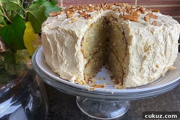 Purple Ribbon Banana Cake Recipe with Moist Banana Frosting 2 banana cake, slice removed