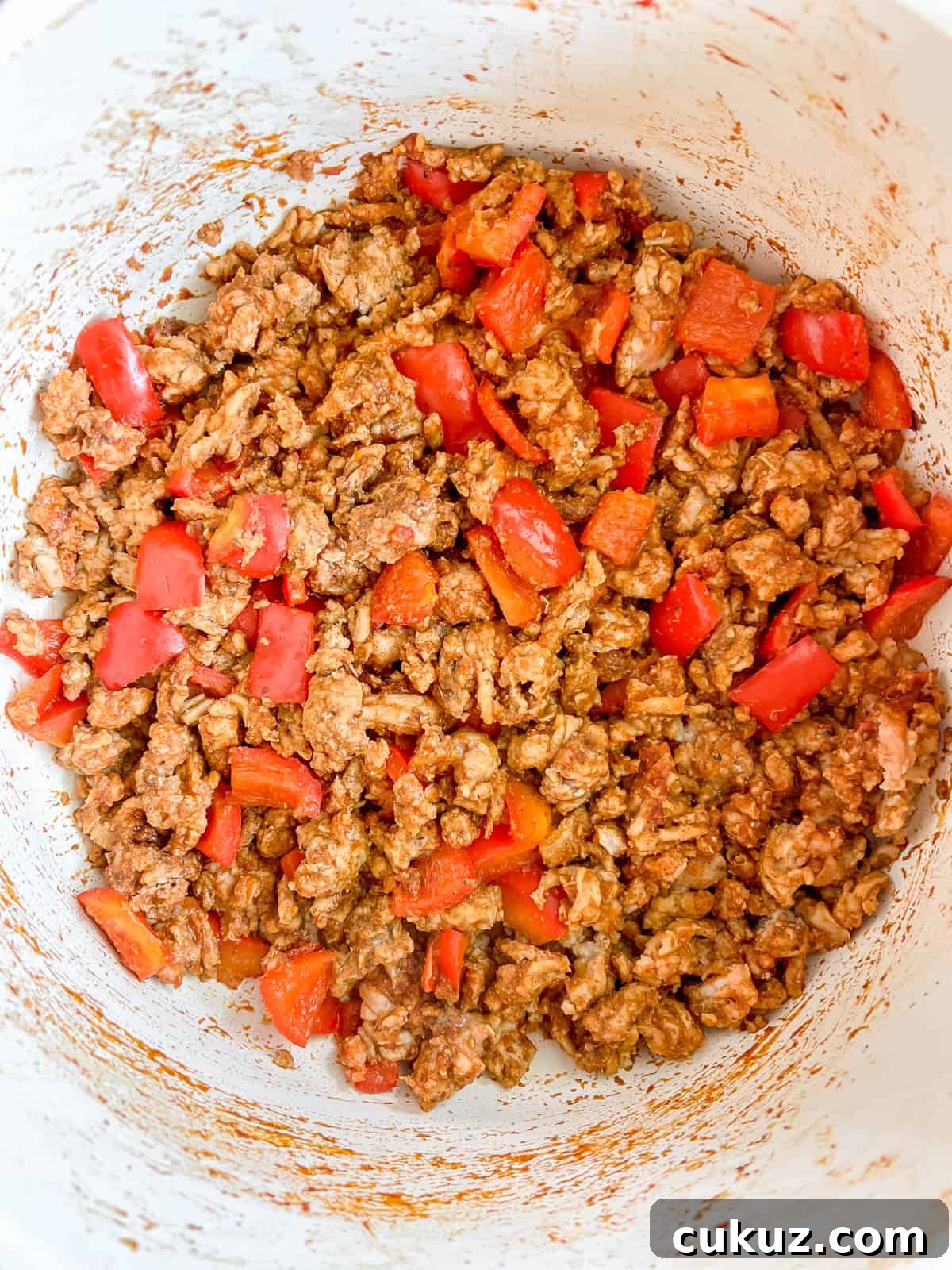 Browned turkey with bell pepper.