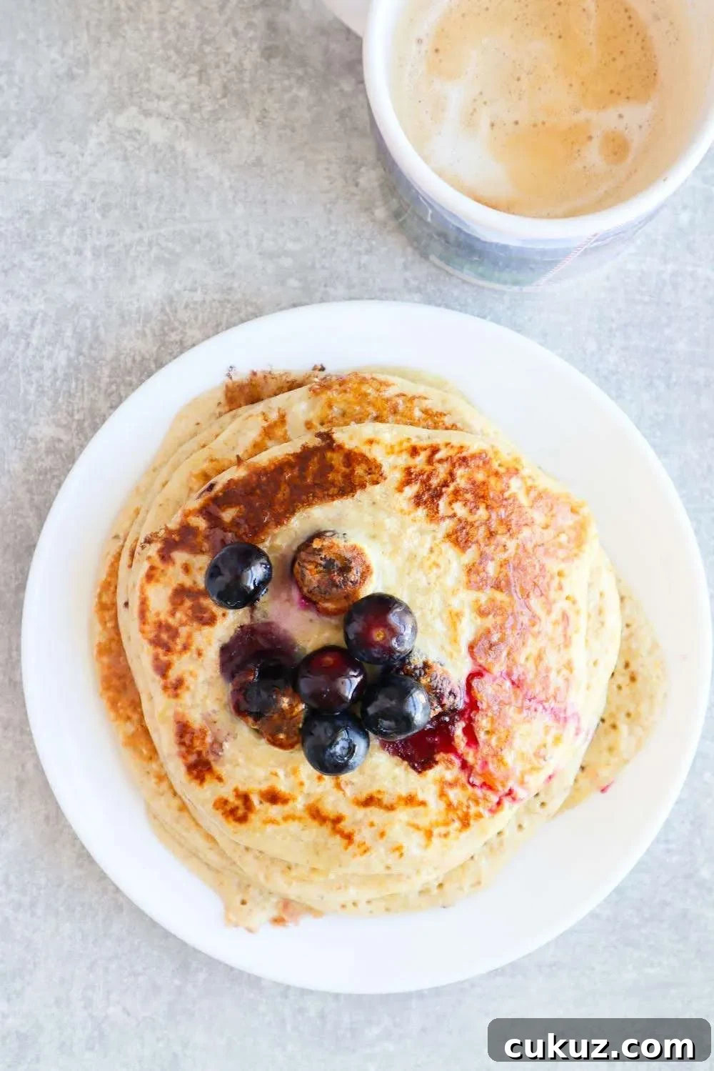 These flourless blueberry oatmeal pancakes are so so delicious! They make a quick and easy healthy breakfast that is kid-friendly too, my toddler loved these! If you're organized you can make the pancakes in about 10-15 minutes. You need 6 simple ingredients and this healthy pancake recipe is made without banana and flour.