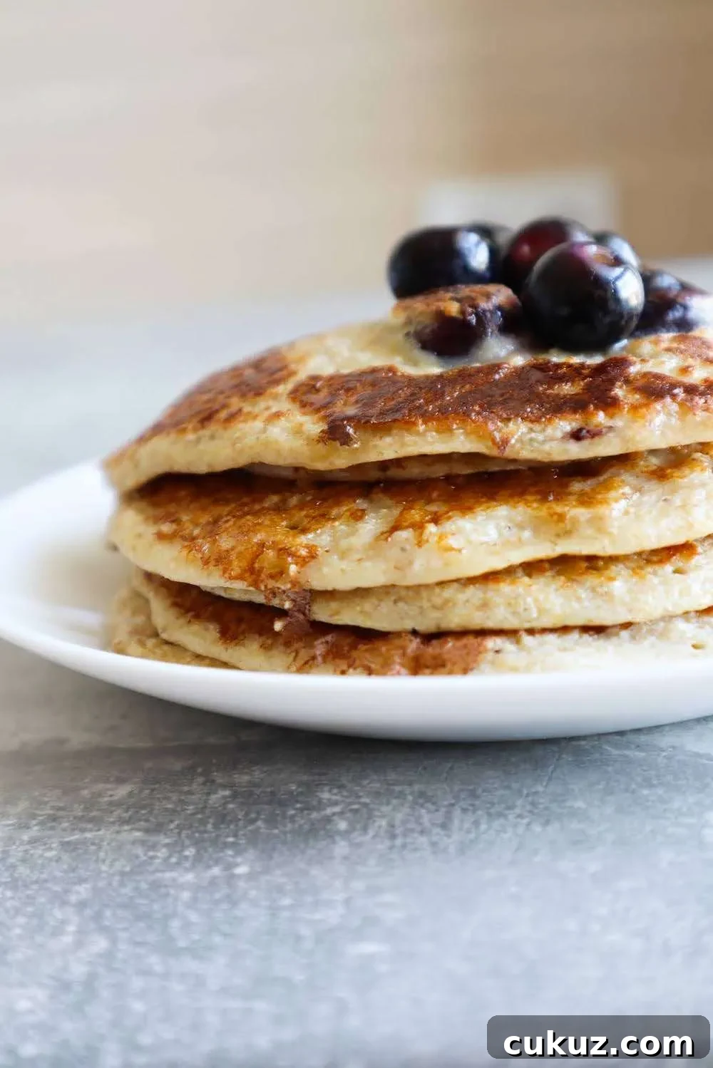 These flourless blueberry oatmeal pancakes are so so delicious! They make a quick and easy healthy breakfast that is kid-friendly too, my toddler loved these! If you're organized you can make the pancakes in about 10-15 minutes. You need 6 simple ingredients and this healthy pancake recipe is made without banana and flour.