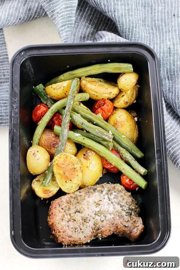 Italian Pork Chop Sheet Pan Dinner in a storage container.