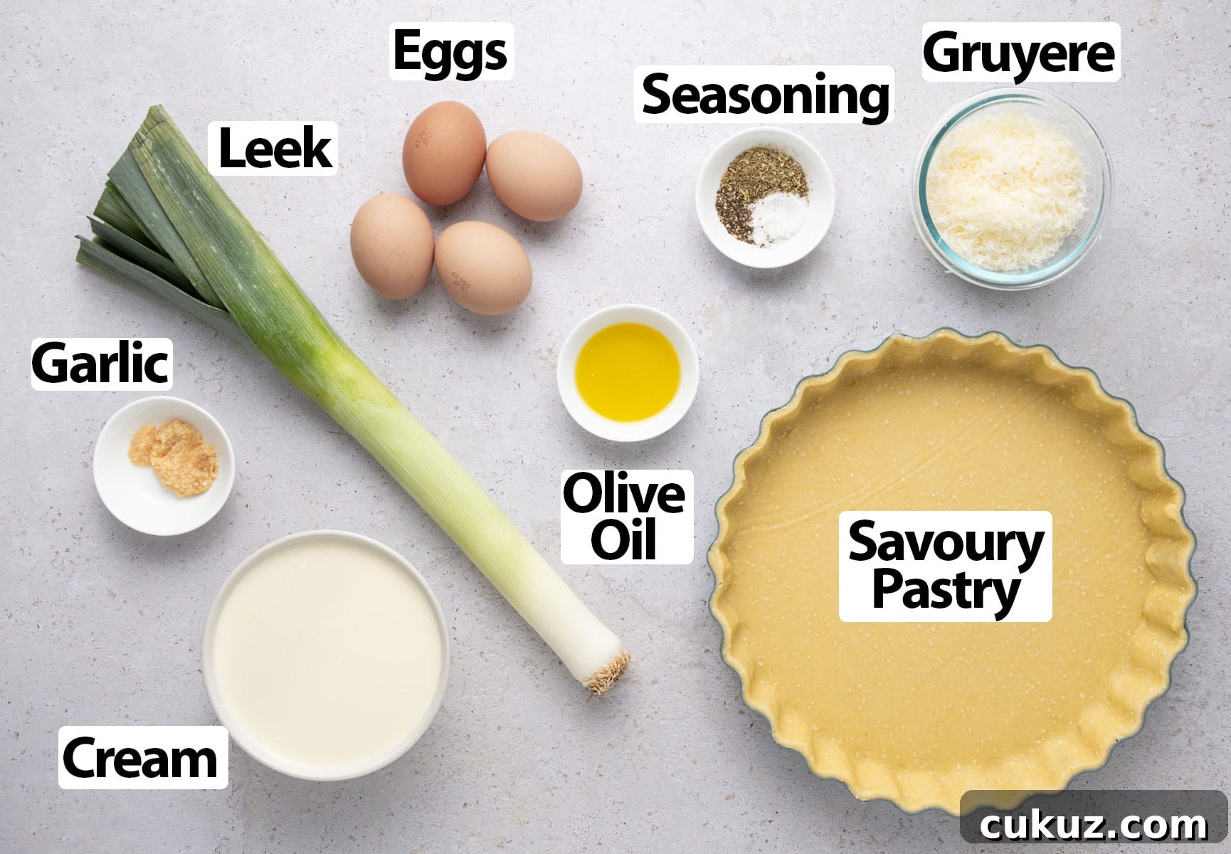 Ingredients laid on a light grey surface.