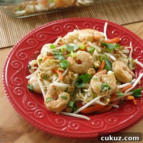 Easy shrimp pad thai recipe on a plate