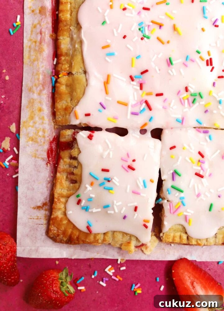 How to Make a Giant Frosted Strawberry Pop-Tart at Home 3 giant strawberry pop tart slice