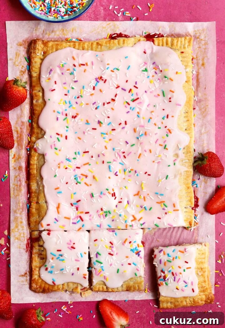 How to Make a Giant Frosted Strawberry Pop-Tart at Home 6 giant strawberry pop tart sliced