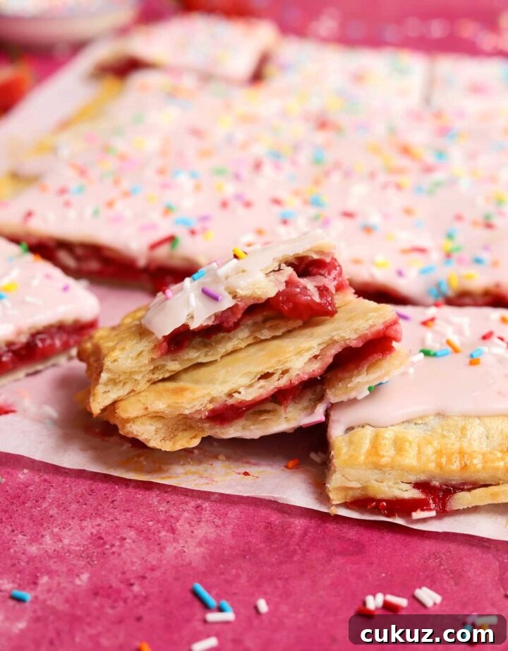 How to Make a Giant Frosted Strawberry Pop-Tart at Home 9 giant strawberry pop tart flaky pastry