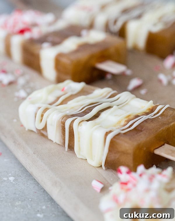 Peppermint Cold Brew Popsicles Recipe: Refreshing Iced Coffee Treat 7 striped popsicles with white chocolate