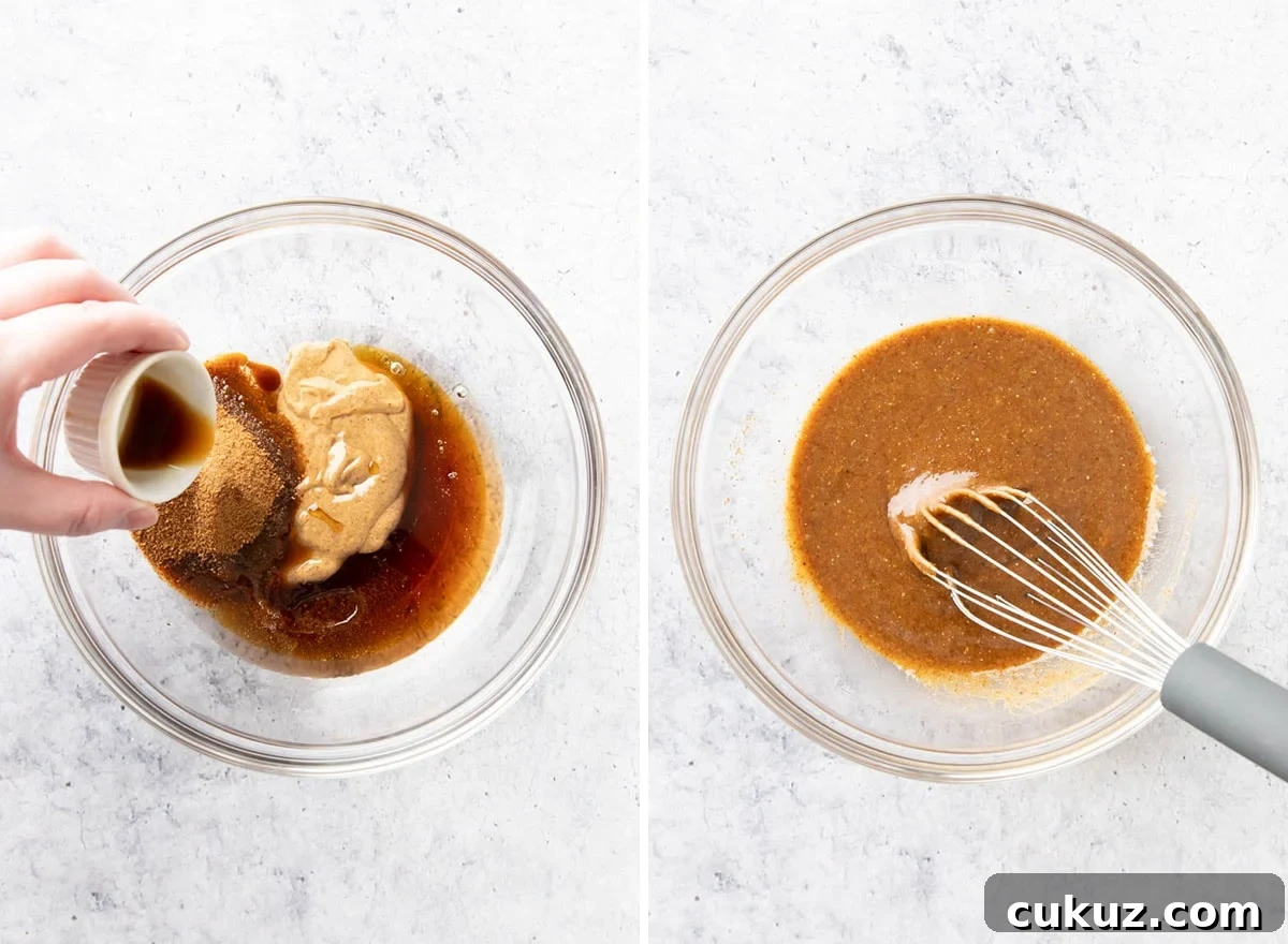 Whisking wet ingredients together in a mixing bowl