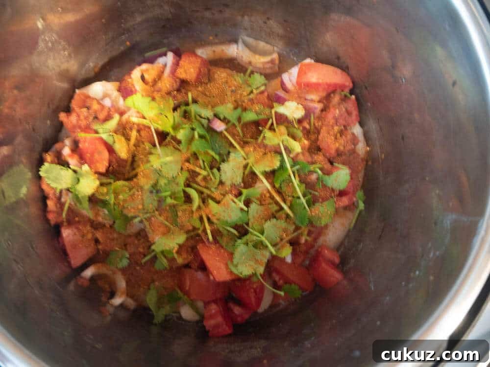 Pressure Cooker Salsa CHicken with Onions and Cilantro