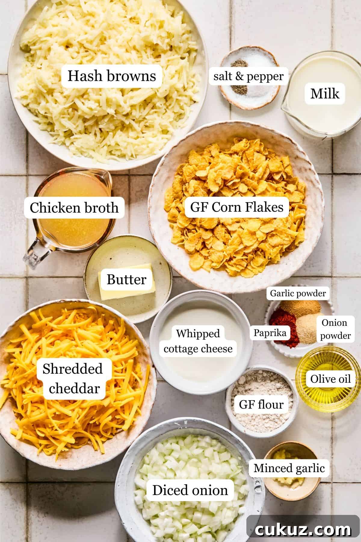 Ingredients for cheesy hashbrown casserole laid out and labeled on a countertop.