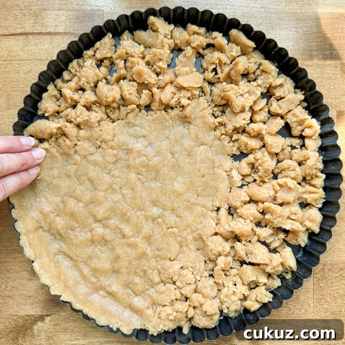 Sausage and Corn Pie with Quick Press‑In Pan Crust 5 pressing crust into pan