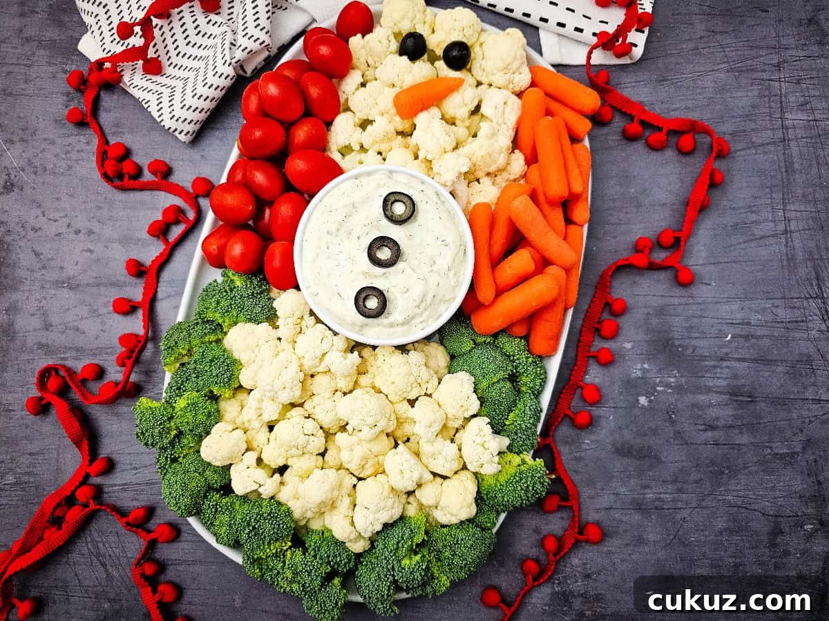 Snowman Veggie Platter against dark background