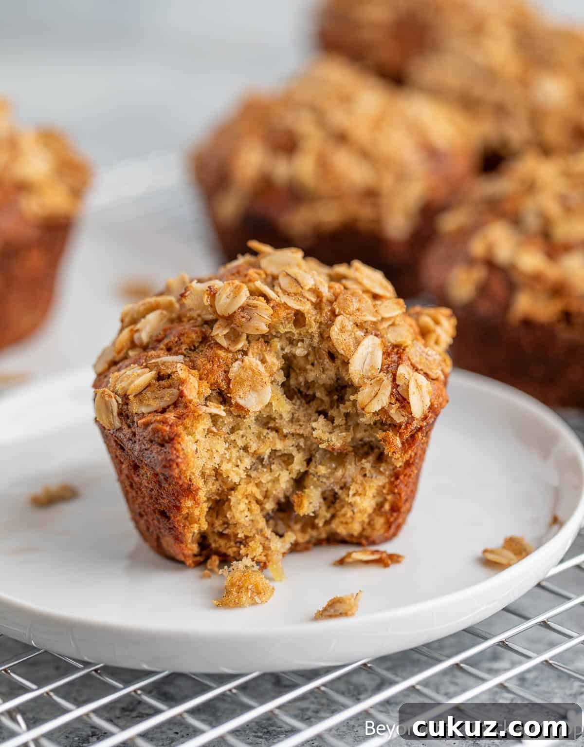 Banana Oatmeal Muffin on a small white plate. 