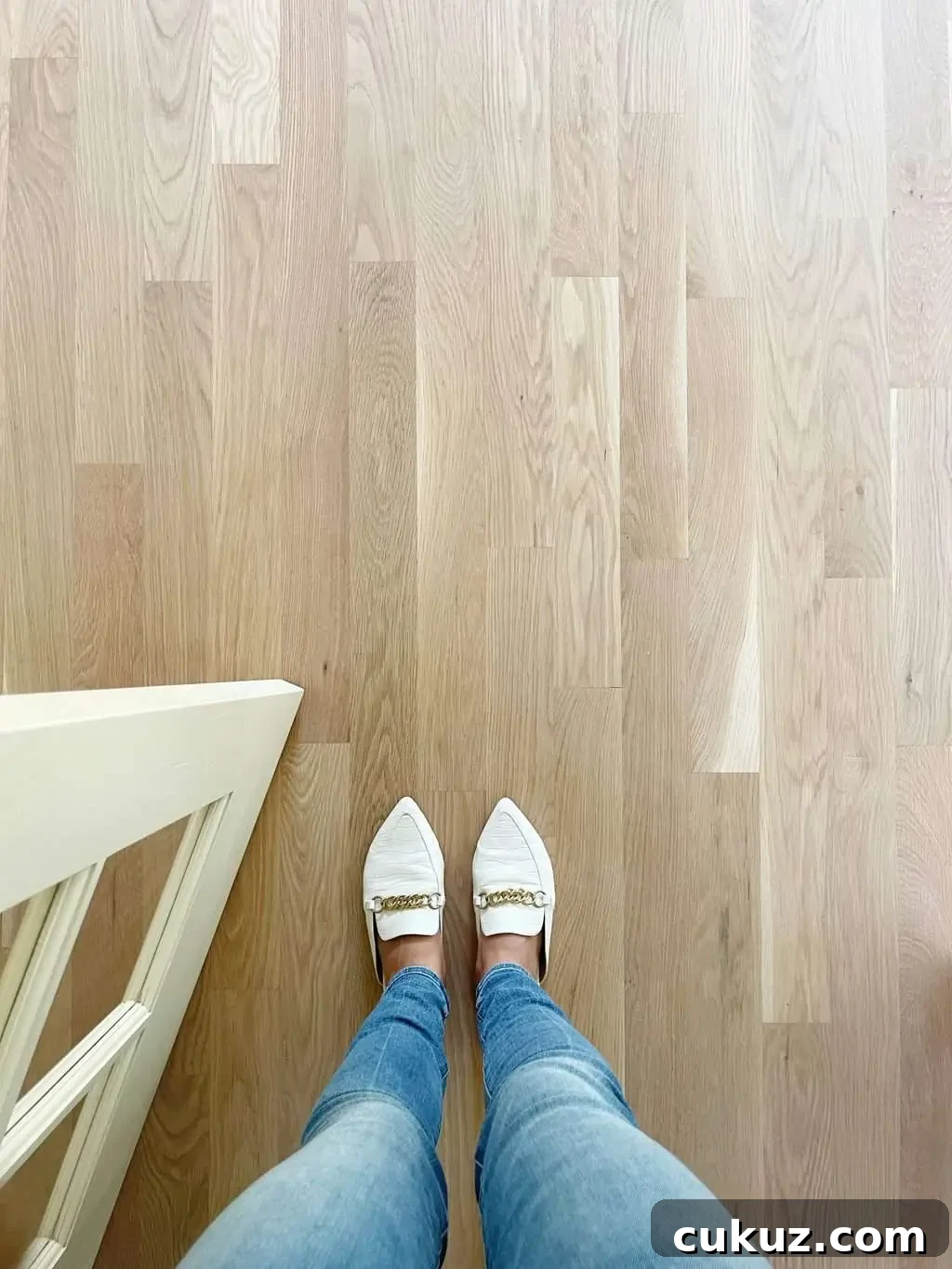 White Oak Flooring Guide: Selection, Installation & Care 13 feet standing on white oak floors no stain