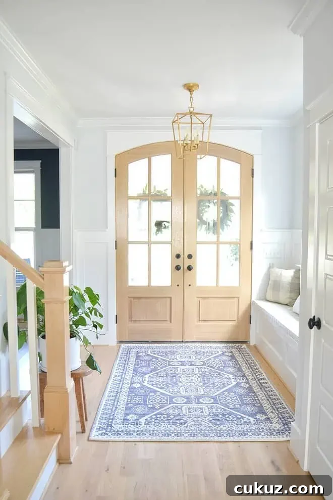 White Oak Flooring Guide: Selection, Installation & Care 6 foyer with glass front doors and white oak hardwood flooring