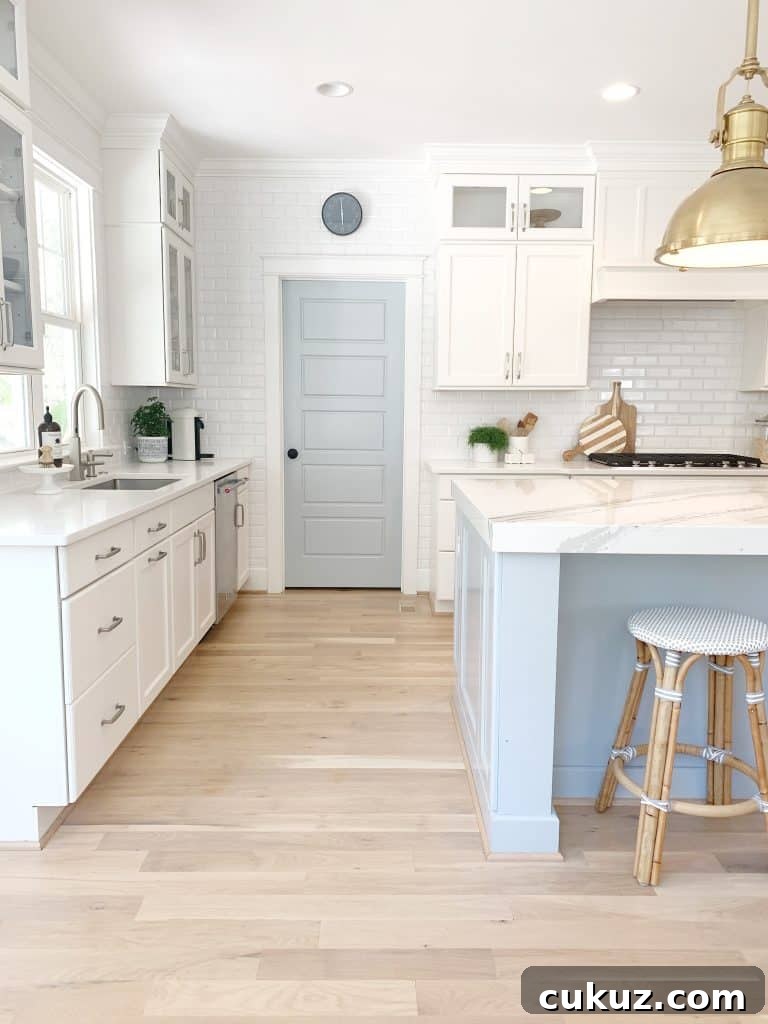 White Oak Flooring Guide: Selection, Installation & Care 9 a kitchen with oak hardwood flooring