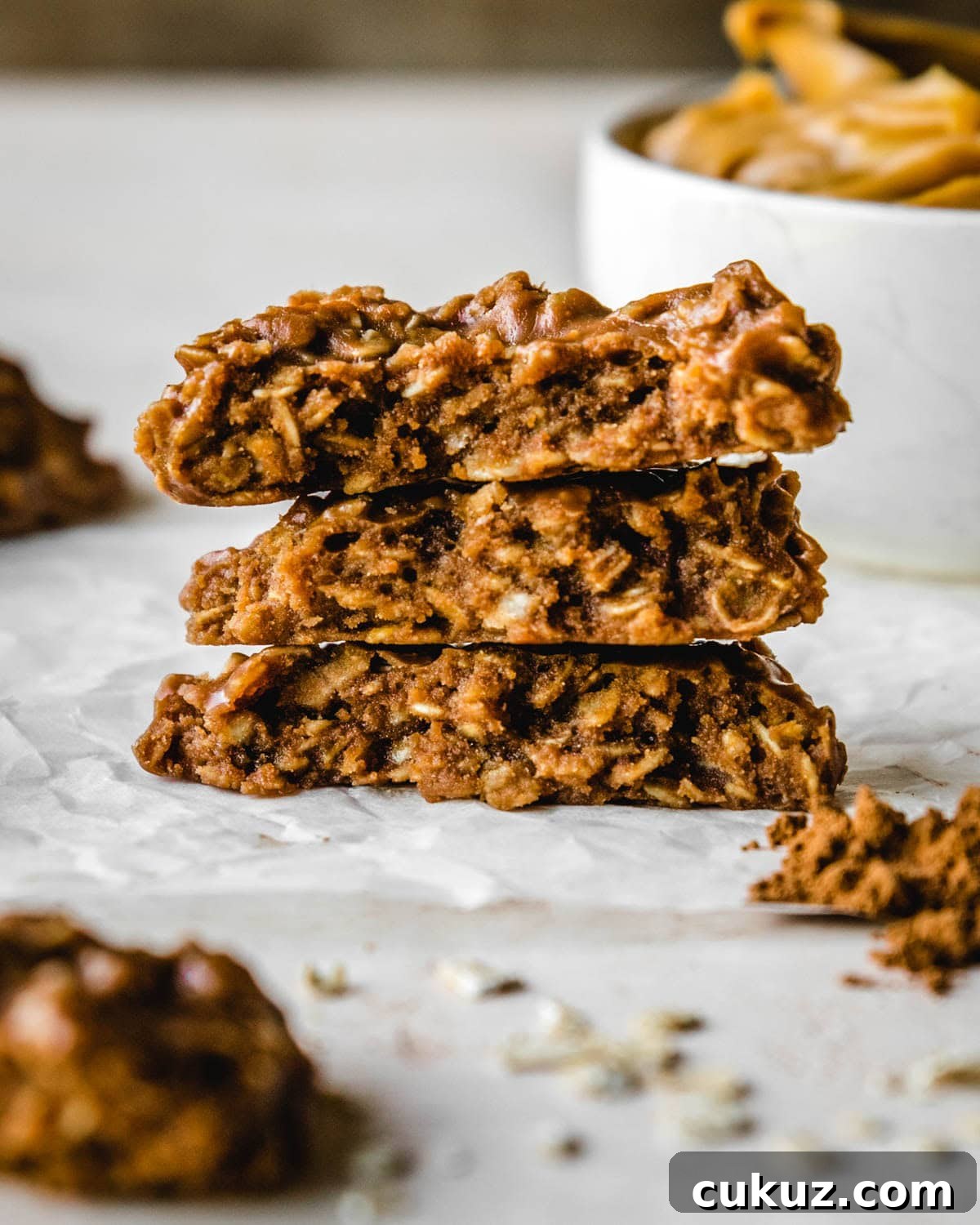 Stack of 3 no-bake cookies cut in half.