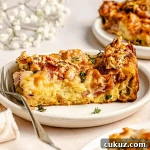 Croque Monsieur Breakfast Casserole slice on a plate.