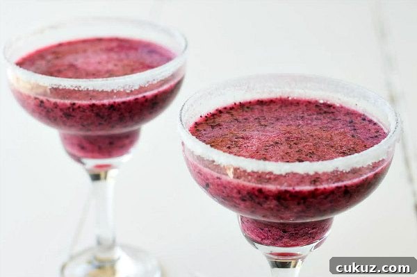 Blueberry Margaritas in two glasses