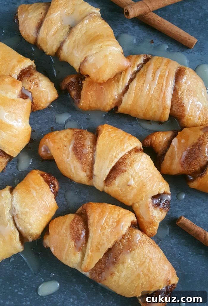 Cinnamon Roll Crescent Rolls - These crescent rolls have all the flavor of cinnamon rolls but they're so much quicker and easier to make. Perfect for an extra-special breakfast or brunch!