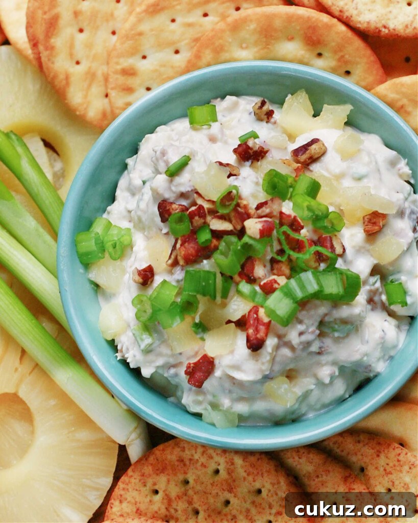 Similar to a cheese ball, these Hawaiian flavors with sweet pineapple and savory ham make for a great make ahead dip