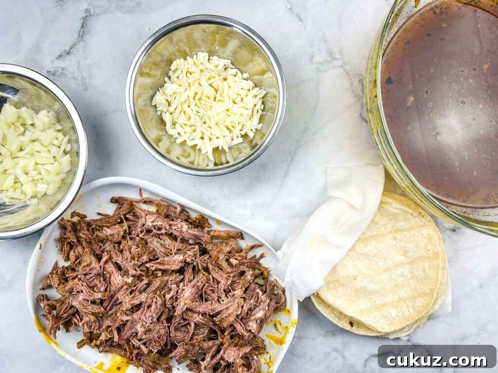 Birria Tacos Recipe with Dipping Consomme 5 Birria taco ingredients ready for assembly.